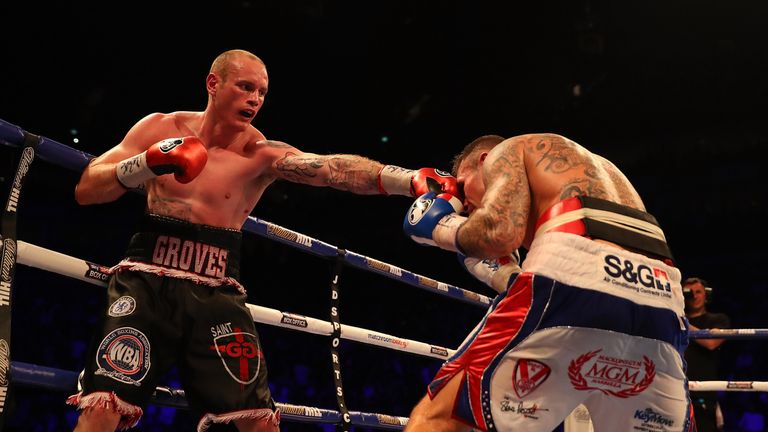 LONDON, ENGLAND - JUNE 25:  George Groves of Great Britain throws a punch at Martin Murray of Great Britainduring their WBA International Super-Middleweigh