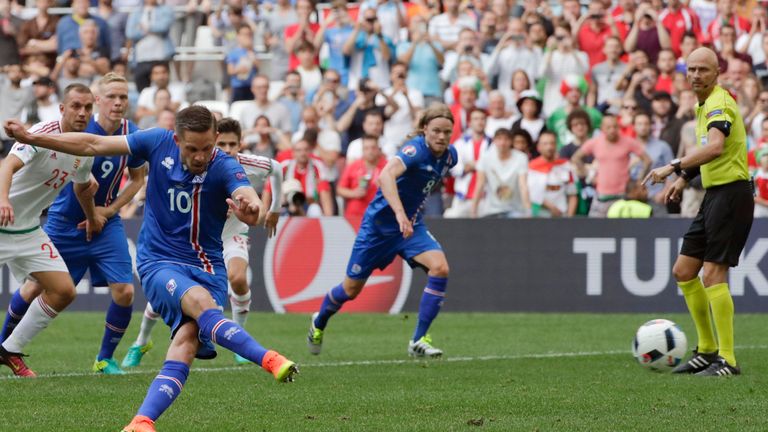 Iceland's Gylfi Sigurdsson scores a penalty 