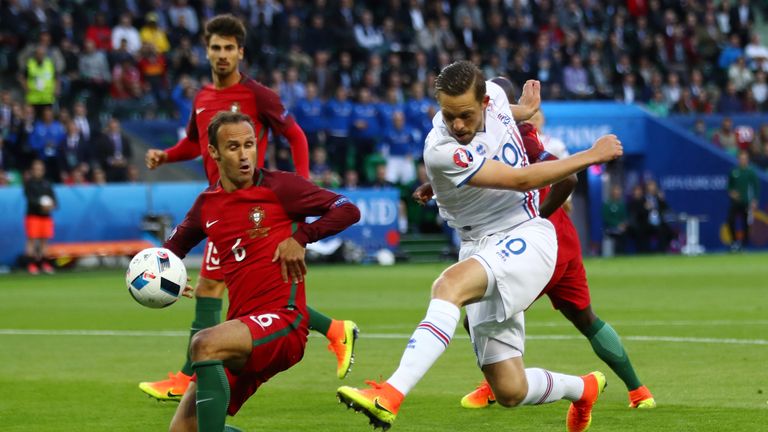 Gylfi Sigurdsson of Iceland shoots at goal during the UEFA EURO 2016 Group F match v Portugal in Saint-Etienne