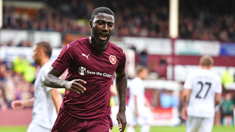 Hearts' Prince Buaben celebrates after scoring a penalty to equalise