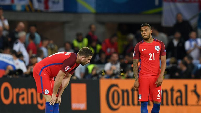 England midfielder Jordan Henderson (L) and England defender Ryan Bertrand react following their draw during the Euro 2016 match against Slovakia