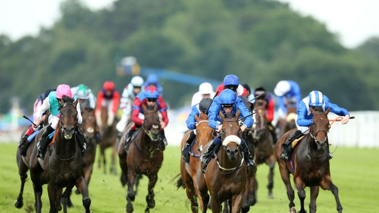 Ribchester ridden by William Buick (centre) wins the Jersey Stakes