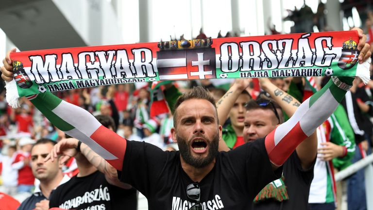 Hungary fans cheer before the start of the Euro 2016 group F football match between Hungary and Austria at the Matmut Atlantique stadium in Bordeaux