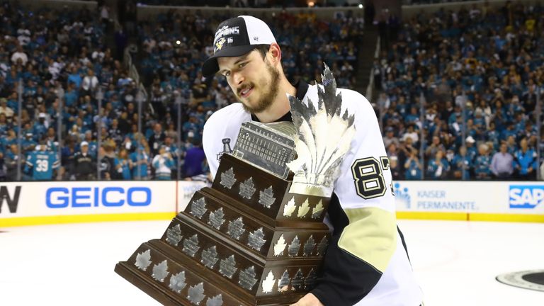 Sidney Crosby celebrates being awarded the Conn Smythe trophy as the MVP of the playoffs