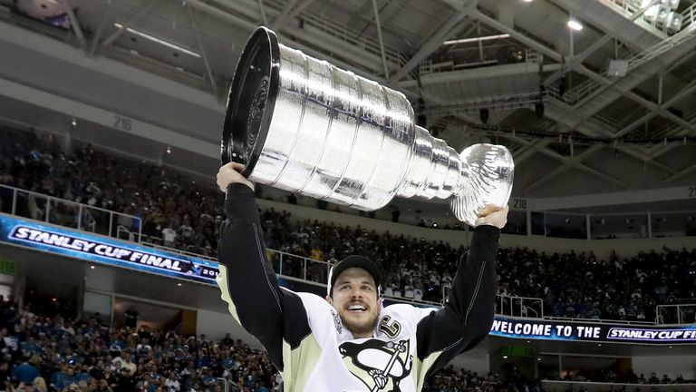 Sidney Crosby of the Pittsburgh Penguins celebrates with the Stanley Cup 