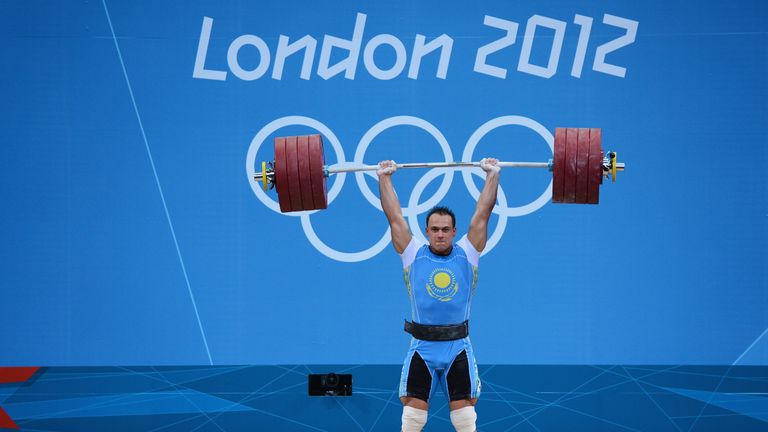 LONDON, ENGLAND - AUGUST 04:  Ilya Ilyin of Kazakhstan sets a new world record and wins the gold medal in the Men's 94kg Weightlifting final on Day 8 of th