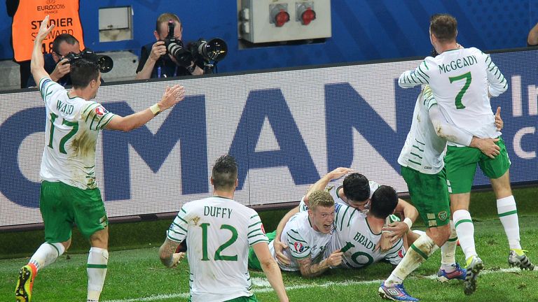 Ireland's midfielder Robert Brady celebrates scoring a goal