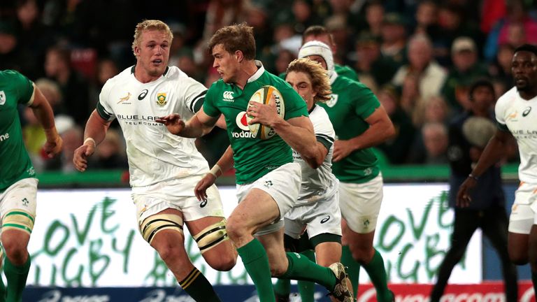 Andrew Trimble makes a break in the narrow defeat for Ireland