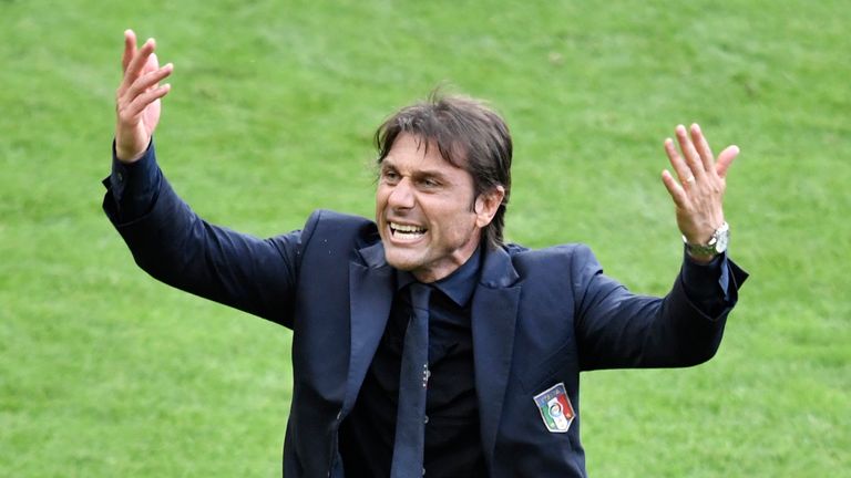 Italy's coach Antonio Conte gestures during Euro 2016 round of 16 football match between Italy and Spain at the Stade de France stadium in Saint-Denis, nea