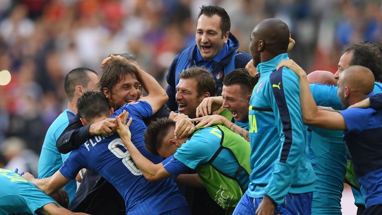 PARIS, FRANCE - JUNE 27: Antonio Conte head coach of Italy celebrates his team's 2-0 win with his team players and staffs after the UEFA EURO 2016 round of