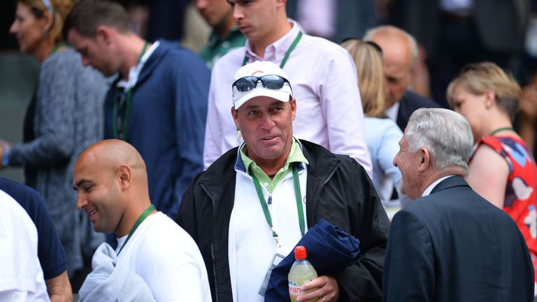 Czech-US coach Ivan Lendl arrives on Centre Court to watch Britain's Andy Murray play against Britain's Liam Broady during their men's singles first round 