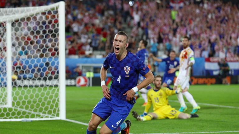 Ivan Perisic wheels away in celebration after scoring the winner