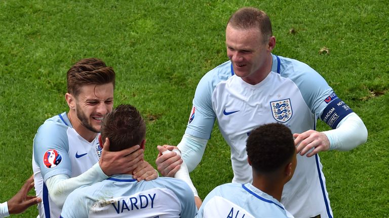 England forward Jamie Vardy is congratulated by Wayne Rooney and Adam Lallana