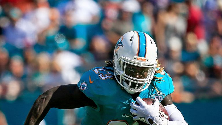 MIAMI GARDENS, FL - JANUARY 03: Jay Ajayi #23 of the Miami Dolphins in action during the first half of the game against the New England Patriots at Sun Lif