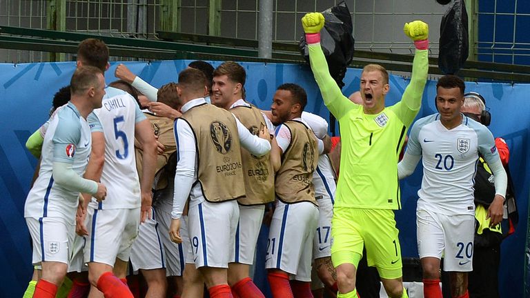 England's goalkeeper Joe Hart (2nd R) and team-mates celebrate against Wales