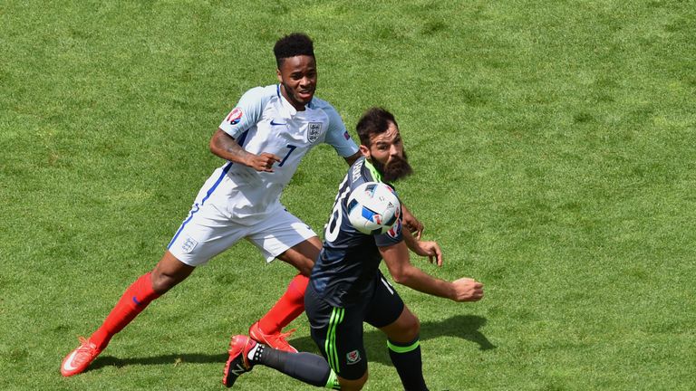 England's midfielder Raheem Sterling (L) vies for the ball with Wales' midfielder Joe Ledley during the Euro 2016 group B football match between England an