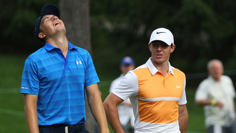 Jordan Spieth walks with Rory McIlroy of Northern Ireland on the 13th hole during the first round of The Memorial Tournament