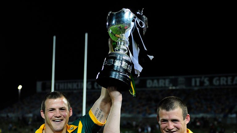 TOWNSVILLE, AUSTRALIA - OCTOBER 13:  (L-R) Josh and Brett Morris hold up the trophy after winning  the International Test match between the Australian Kang