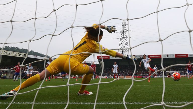 Karen Carney of England scores from the penalty spot