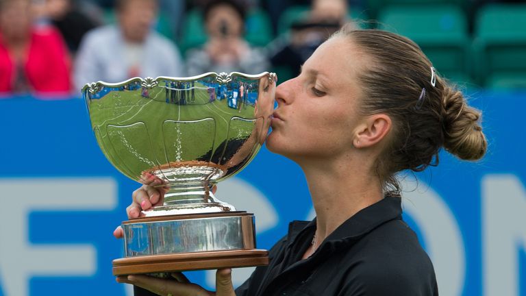 Karolina Pliskova celebrates with the trophy after winning the Aegon Open in Nottingham