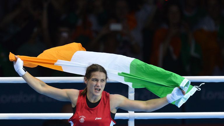 Katie Taylor of Ireland celebrates defeating Sofya Ochigava of Russia to win gold during the women's boxing Lightweight final of the 2012 