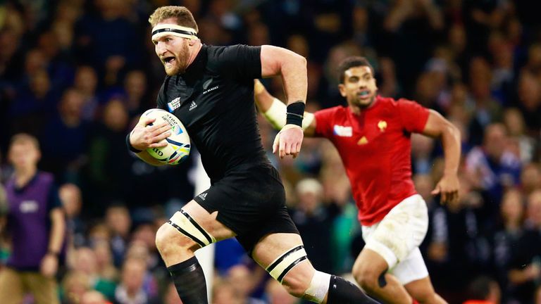 New Zealand captain Kieran Read charges through the France defence