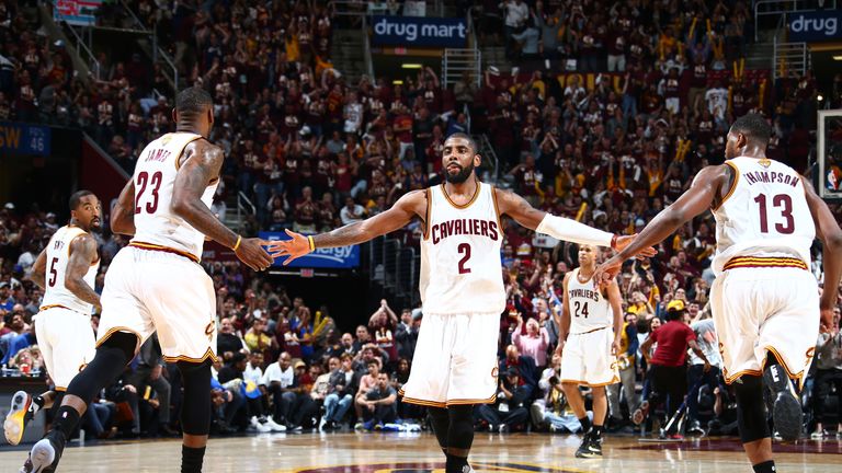 Kyrie Irving, LeBron James and Tristan Thompson of the Cleveland Cavaliers 