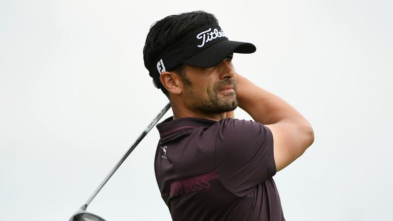 Lee Slattery of England plays his shot from the 12th tee during the continuation of the weather delayed first round of the U.S. Open