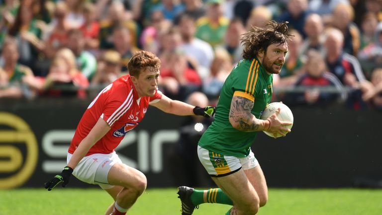 Mickey Burke of Meath in action against Ryan Burns of Louth