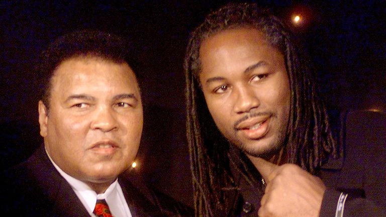 Muhammad Ali (L) poses with Lennox Lewis at the launch of a new Playstation game called 'Knockout Kings' in London, 15 January 2001