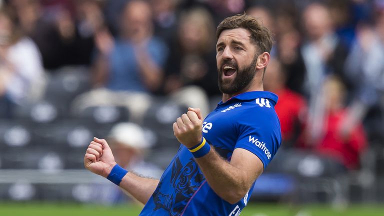 Liam Plunkett celebrates after bowling to take the wicket of Sri Lanka's Kusal Mendis, caught by England's Alex Hales, for 53 runs during play in