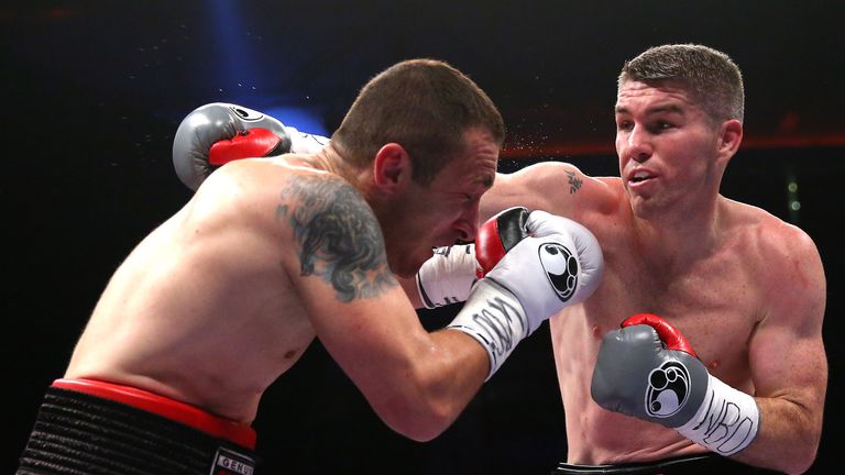 Liam Smith lands a right hand on Predrag Radosevic 