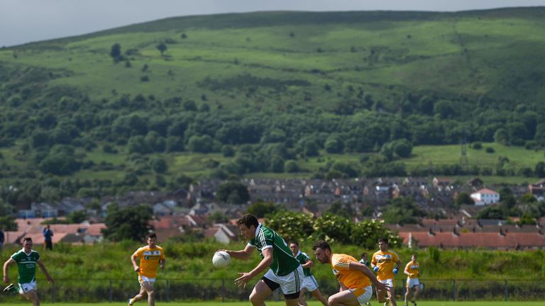 Thomas Childs of Limerick in action against Mathew Fitzpatrick of Antrim at Corrigan Park in Belfast. 