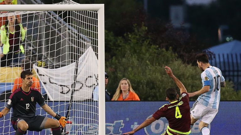 Lionel Messi scores by Dani Hernandez in the second half of Argentina's 4-1 win over Venezuela at the 2016 Copa America Centenario