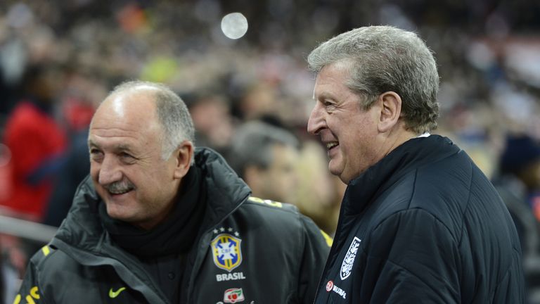 England's manager Roy Hodgson (R) greets Brazil's manager Felipe Scolari (L) before the start of the international friendly football match between England 