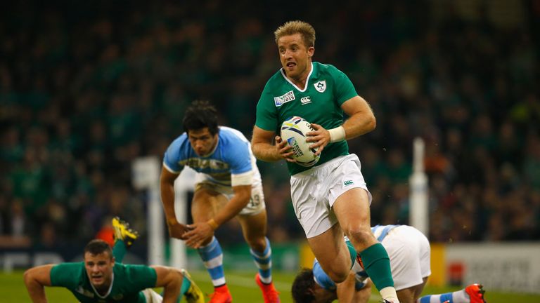 Luke Fitzgerald of Ireland breaks through to score his team's first try