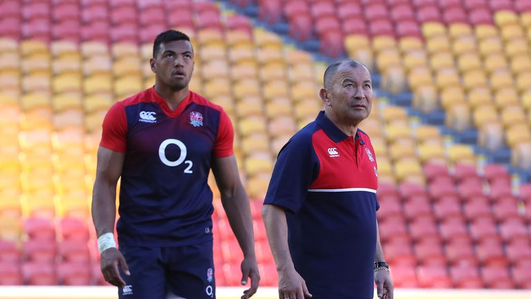 BRISBANE, AUSTRALIA - JUNE 10:  Eddie Jones, (R) the England head coach looks on with Luther Burrell duirng the England captain's run held at the Suncop St