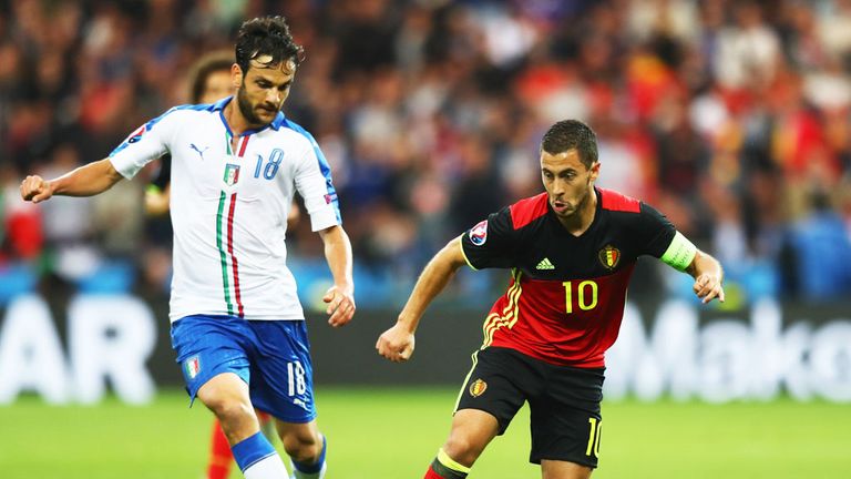 Italy midfielder Marco Parolo closes down Belgium's Eden Hazard