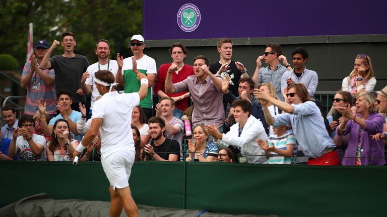 Marcus Willis celebrates with the crowd during his match with Berankis