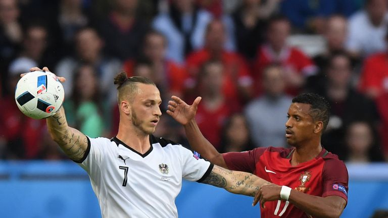 PARIS, FRANCE - JUNE 18:  Nani of Portugal and Marko Arnautovic of Austria in dissagreament during the UEFA EURO 2016 Group F match between Portugal and Au