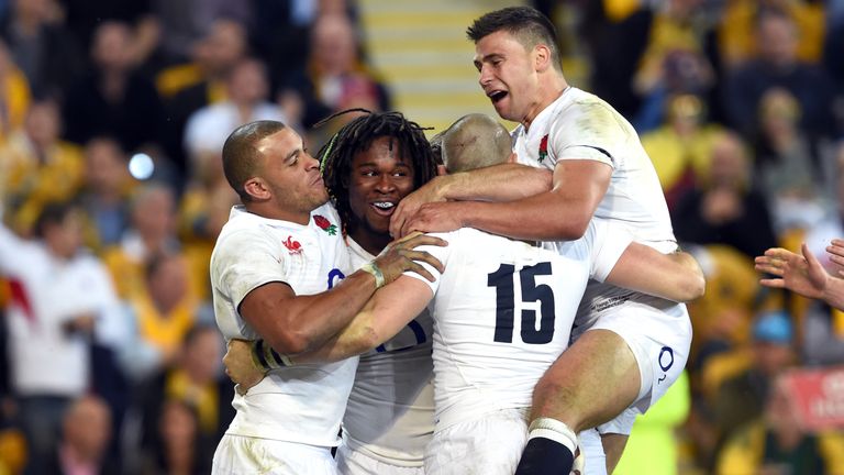 England's Marland Yarde is congratulated by teammates after scoring against Australia