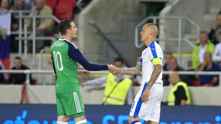 Slovakia's Martin Skrtel (right) and Northern Ireland's Kyle Lafferty shake hands