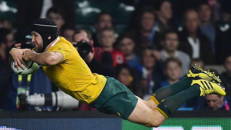 Australia's centre Matt Giteau scores his team's third try during a Pool A match of the 2015 Rugby World Cup between England and Australia at Twickenham st