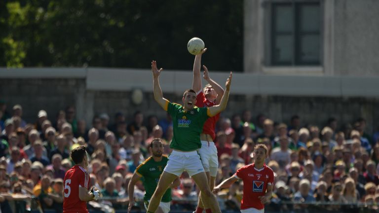 James Stewart of Louth in action against Cian O'Brien of Meath