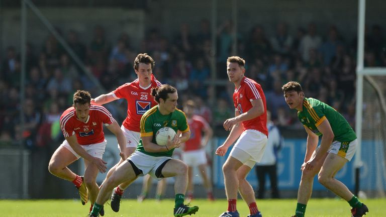 Cillian O'Sullivan of Meath in action against Declan Byrne of Louth