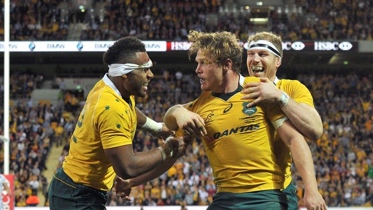 Michael Hooper celebrates scoring a try during the Brisbane Test