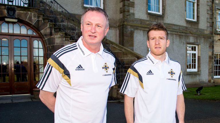 24/03/15.DALMAHOY - EDINBURGH.Northern Ireland manager Michael O'Neill (left) and Steven Davis look ahead to their upcoming tie with Scotland.