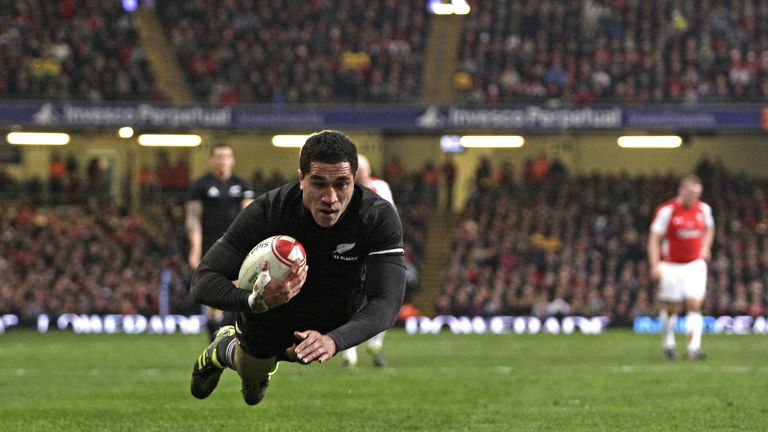 New Zealand full back Mils Muliaina dives over to score a try during the Autumn International rugby union match between Wales and New Zealand at The Millen