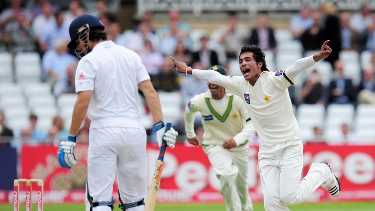 NOTTINGHAM, ENGLAND - JULY 29:  Mohammad Amir of Pakistan celebrates the wicket of Alastair Cook of England during day one of the npower 1st Test Match be