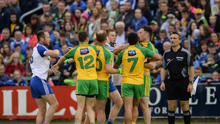 Players from both teams tussle off the ball in the game between Donegal and Monaghan at Kingspan Breffni Park in Cavan. 